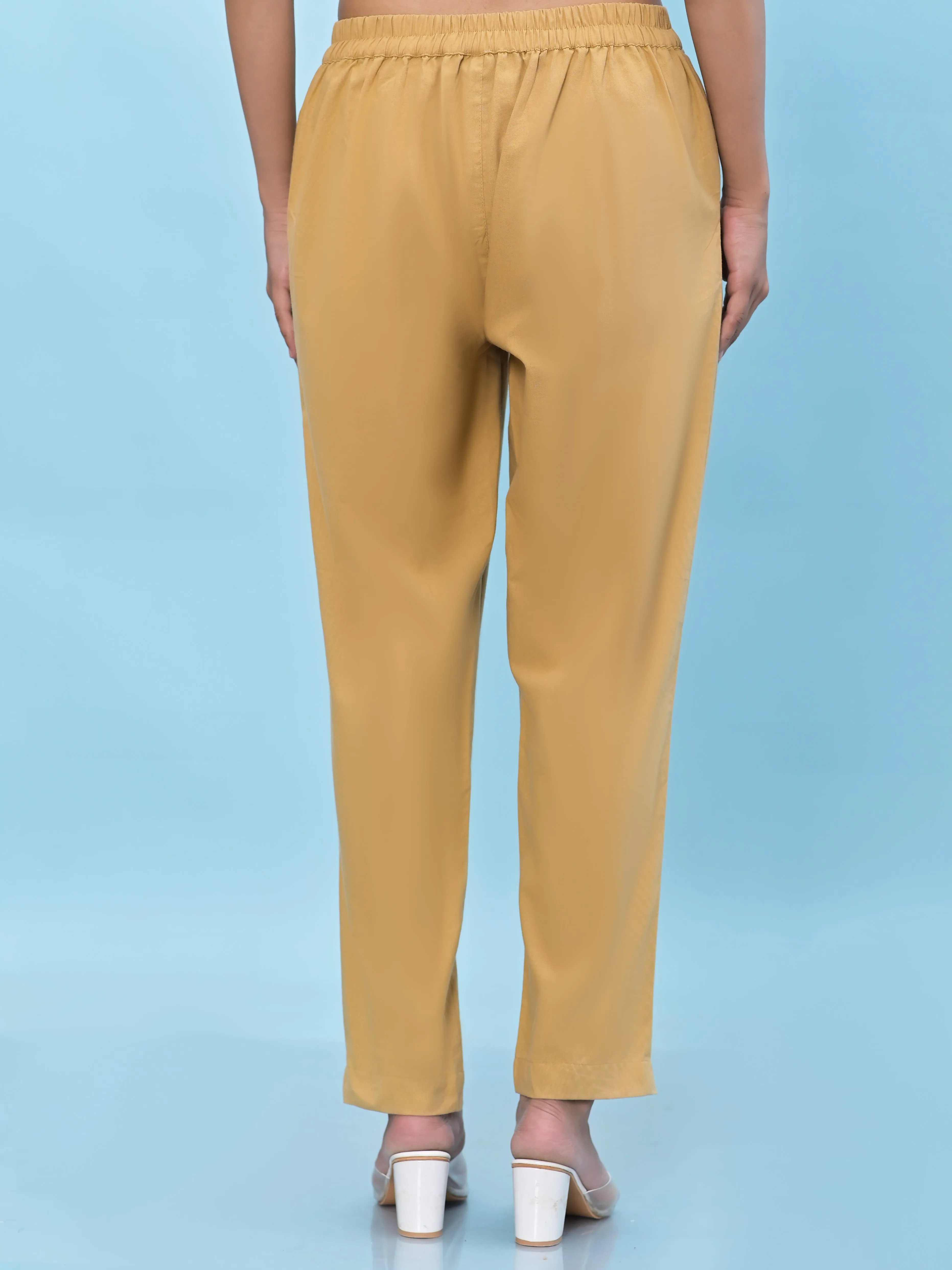 Jashvi Women Gold Solid Cotton Pants with Partially Elasticated Waistband and Two Side Pockets